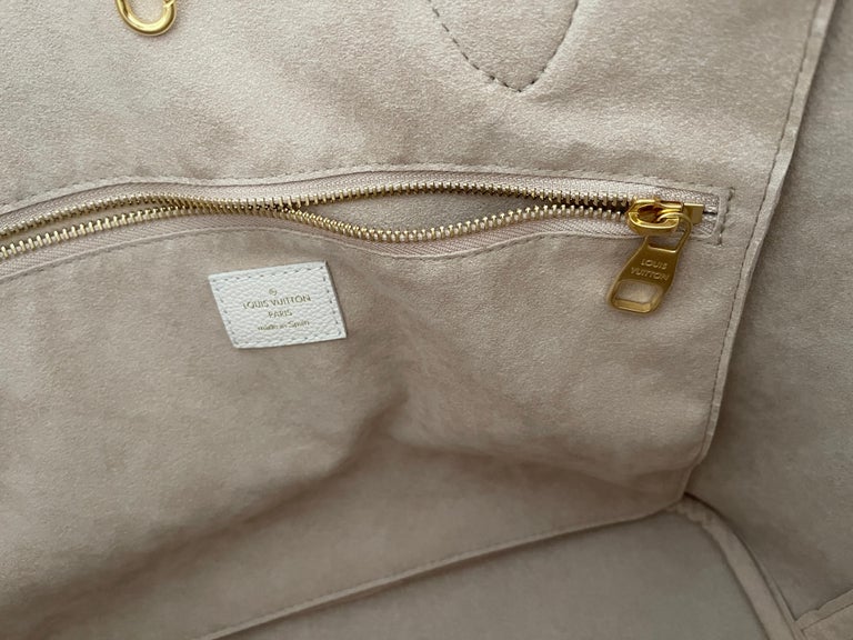 Louis Vuitton Beige Patent Leather Rolled Handle Monogram Interior Pocket  Bag — Labels Resale Boutique
