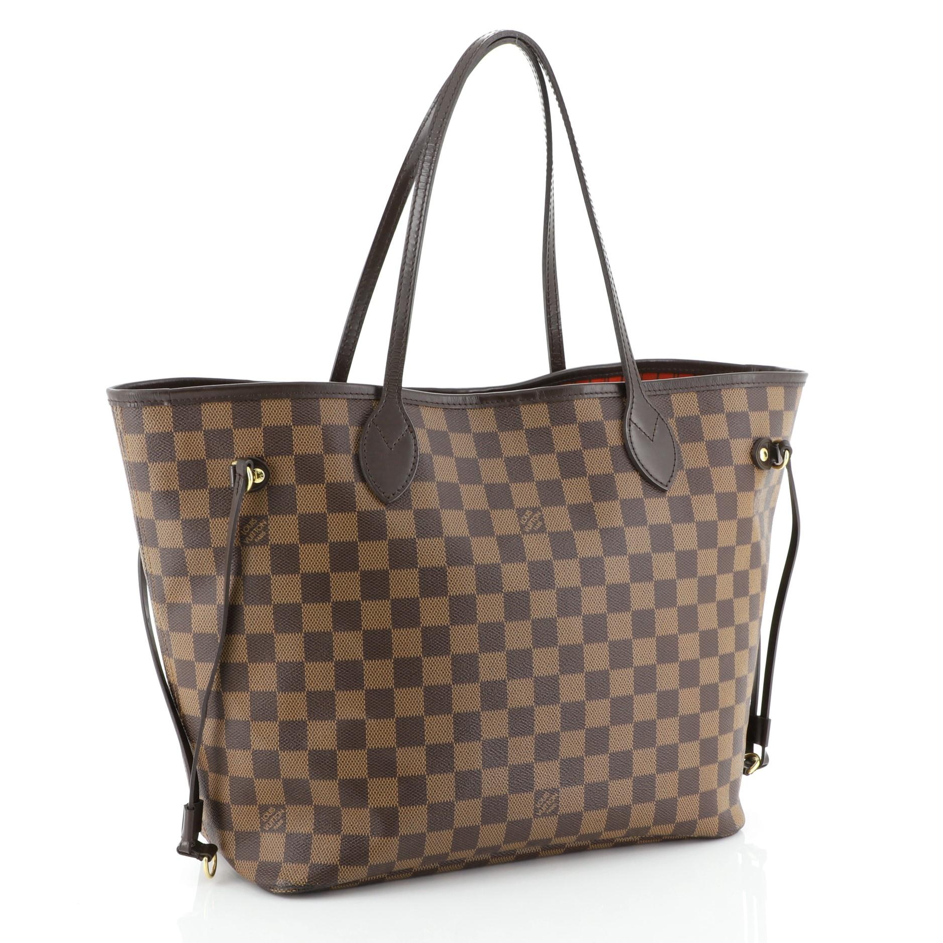 This Louis Vuitton Neverfull NM Tote Damier MM, crafted in damier ebene coated canvas, features dual slim handles, side laces, and gold-tone hardware. Its wide open top showcases a red fabric interior with side zip pocket. Authenticity code reads: