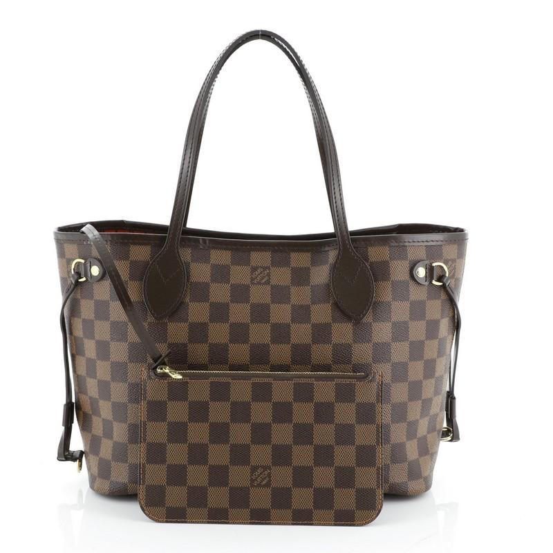 This Louis Vuitton Neverfull NM Tote Damier PM, crafted in damier ebene coated canvas, features dual slim handles, side laces, and gold-tone hardware. Its wide open top showcases a red fabric interior with side zip pocket. Authenticity code reads:
