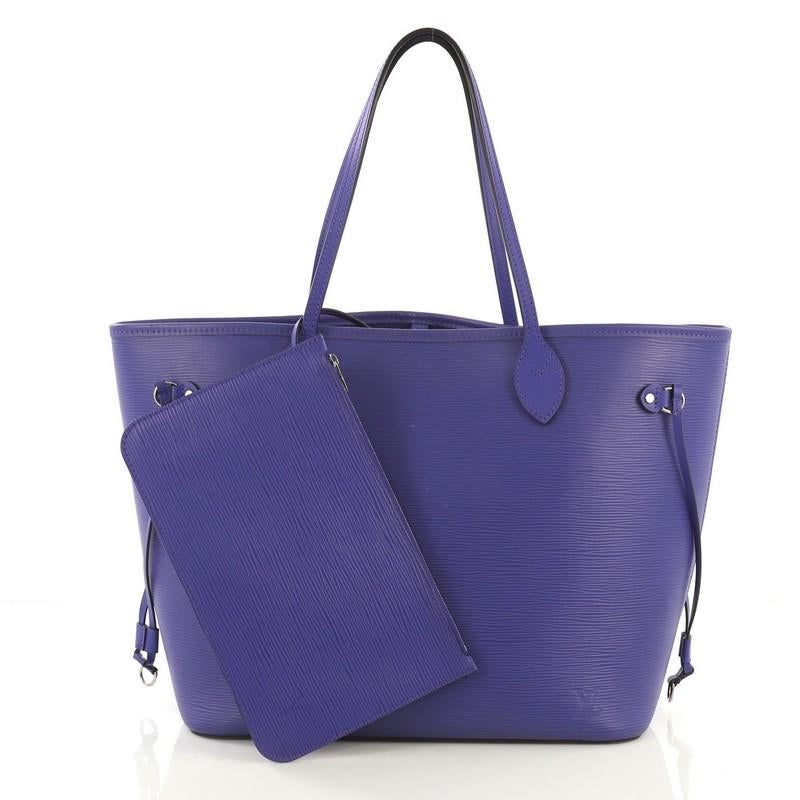 This Louis Vuitton Neverfull Tote Epi Leather MM, crafted in purple epi leather, features dual flat leather handles, side laces, and silver-tone hardware. Its wide open top and center clasped hook closure opens to a purple microfiber interior.