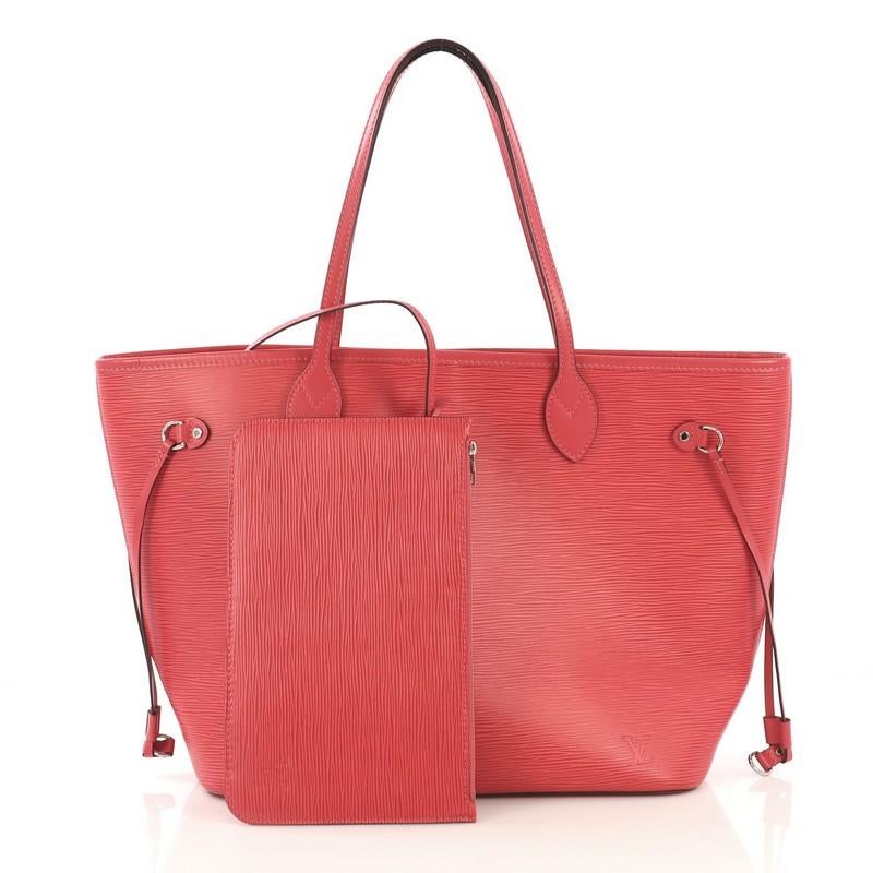This Louis Vuitton Neverfull Tote Epi Leather MM, crafted in pink epi leather, features dual flat leather handles, side laces that cinches and expands the bag, and silver-tone hardware. Its wide open top and center hook closure opens to a pink