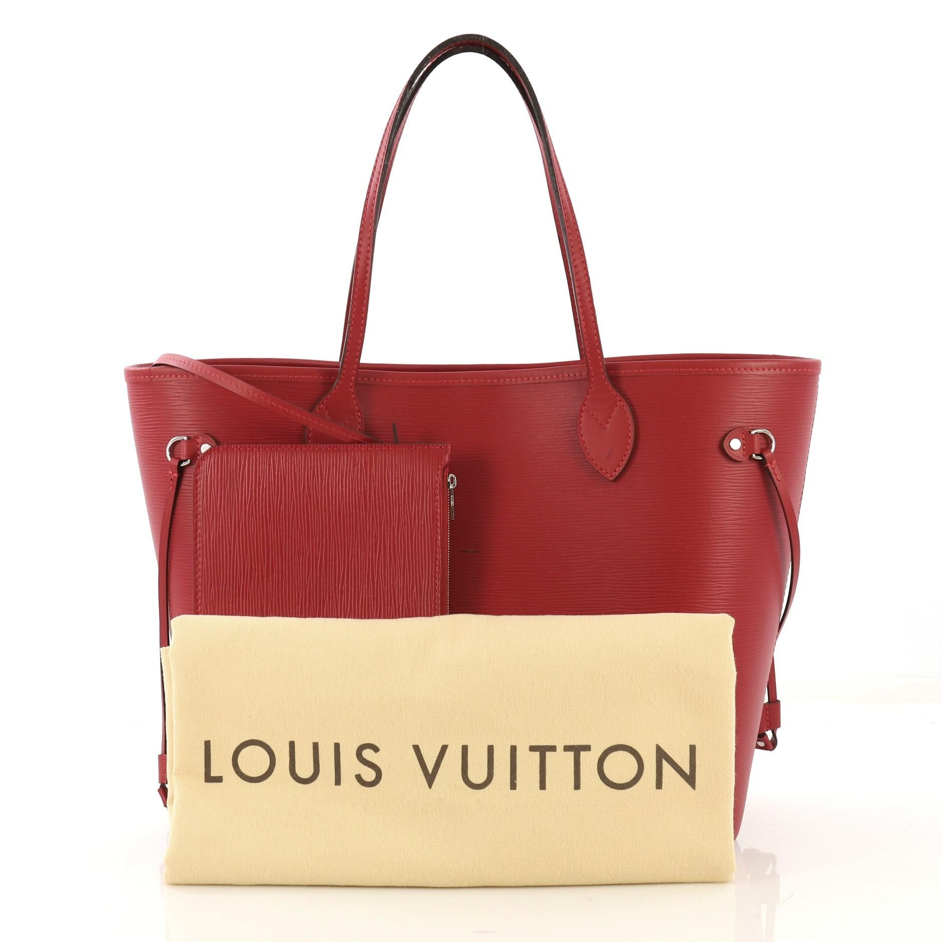 This Louis Vuitton Neverfull Tote Epi Leather MM, crafted in red epi leather, features dual flat leather handles, side laces, and silver-tone hardware. Its wide open top and center hook closure opens to a red microfiber interior. Authenticity code