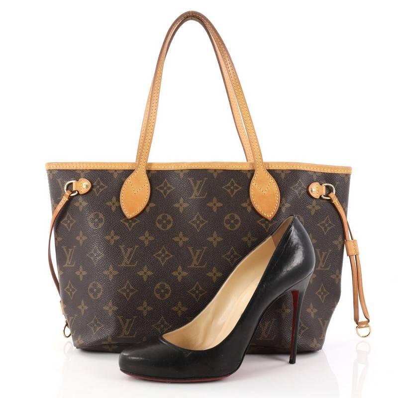 This authentic Louis Vuitton Neverfull Tote Monogram Canvas PM is a perfect companion for daily excursions. Crafted from Louis Vuitton’s signature brown monogram coated canvas, this iconic, easy-to-carry bag features natural cowhide leather trim,
