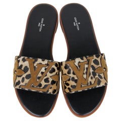 Louis Vuitton NEW Leopard Print Calf Hair Lock It Logo Flat Slide Sandals sz 39