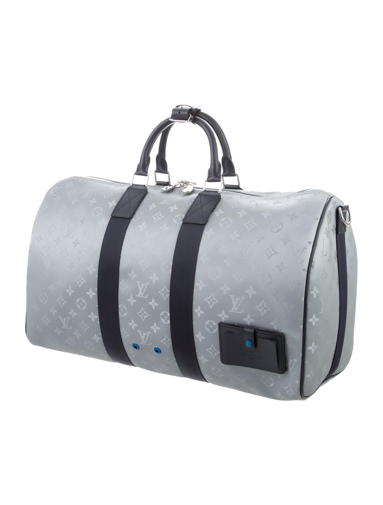 Louis Vuitton NEW Monogram Blue Silver Keepall Eclipse Top Handle Men's Women's Travel Duffle Bag

Monogram canvas 
Leather
Silver-tone hardware
Woven lining
Zipper closure
Made in France
Handle drop 4
