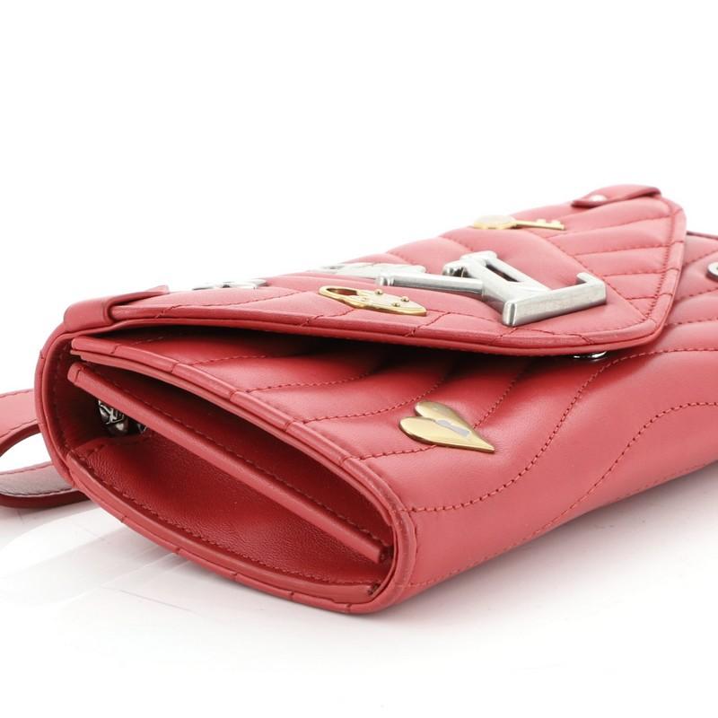Louis Vuitton New Wave Long Portefeuille embelli en cuir matelassé 1