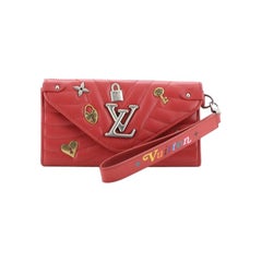 Louis Vuitton New Wave Long Portefeuille embelli en cuir matelassé