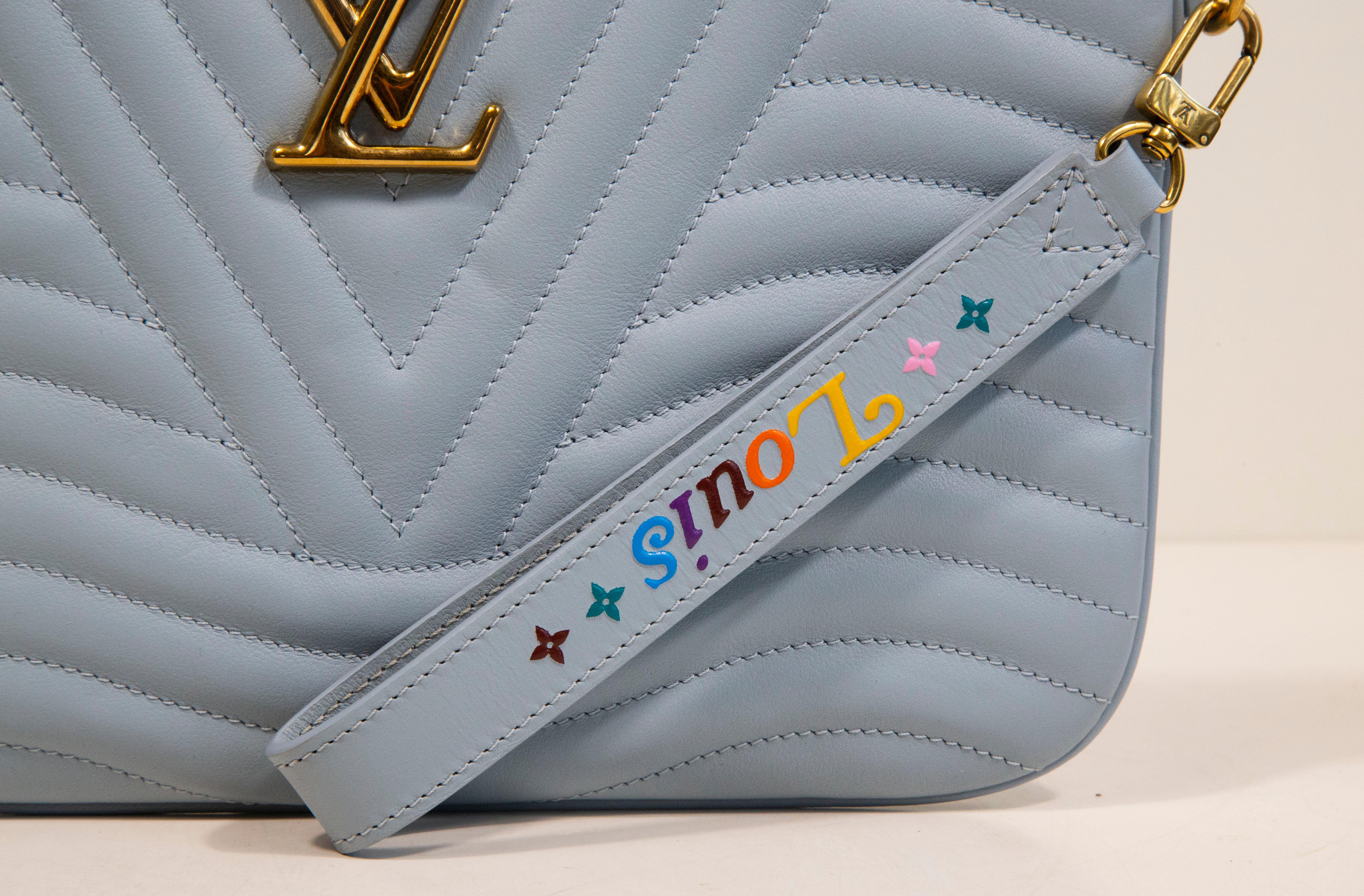 Women's or Men's Louis Vuitton New Wave Zip Pochette in Porcelain Blue Leather 2019 For Sale