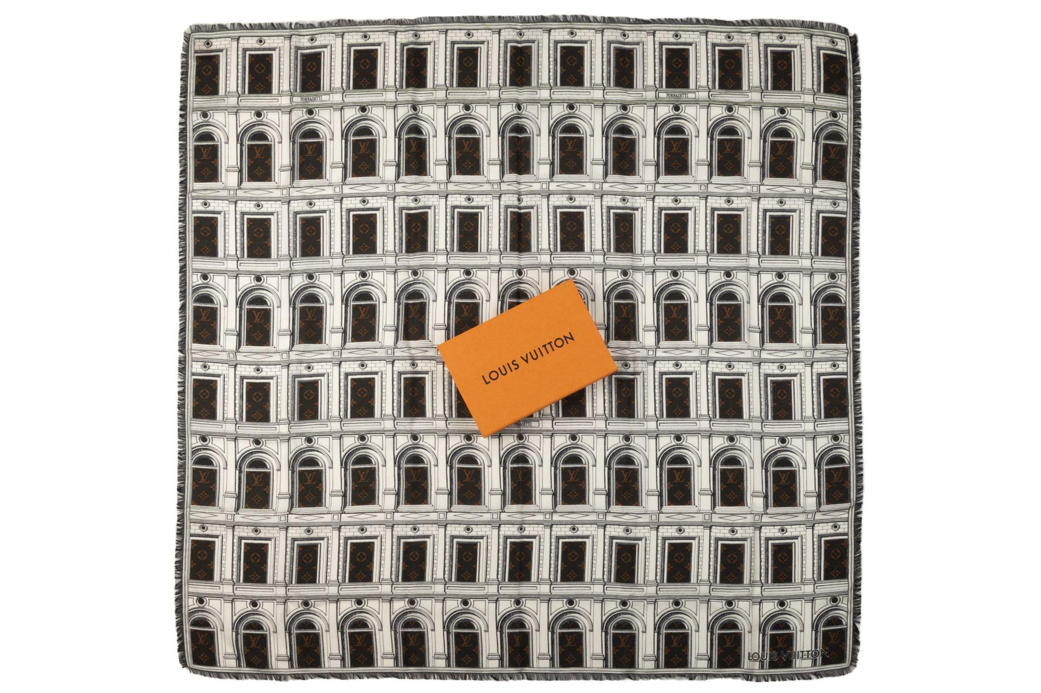 This is an authentic LOUIS VUITTON X FORNASETTI Wool Silk Architettura Shawl in Brown. This stylish large shawl is finely crafted of 61% wool and 39% silk. This shawl features an intricate building illustration from the archives of the artistic