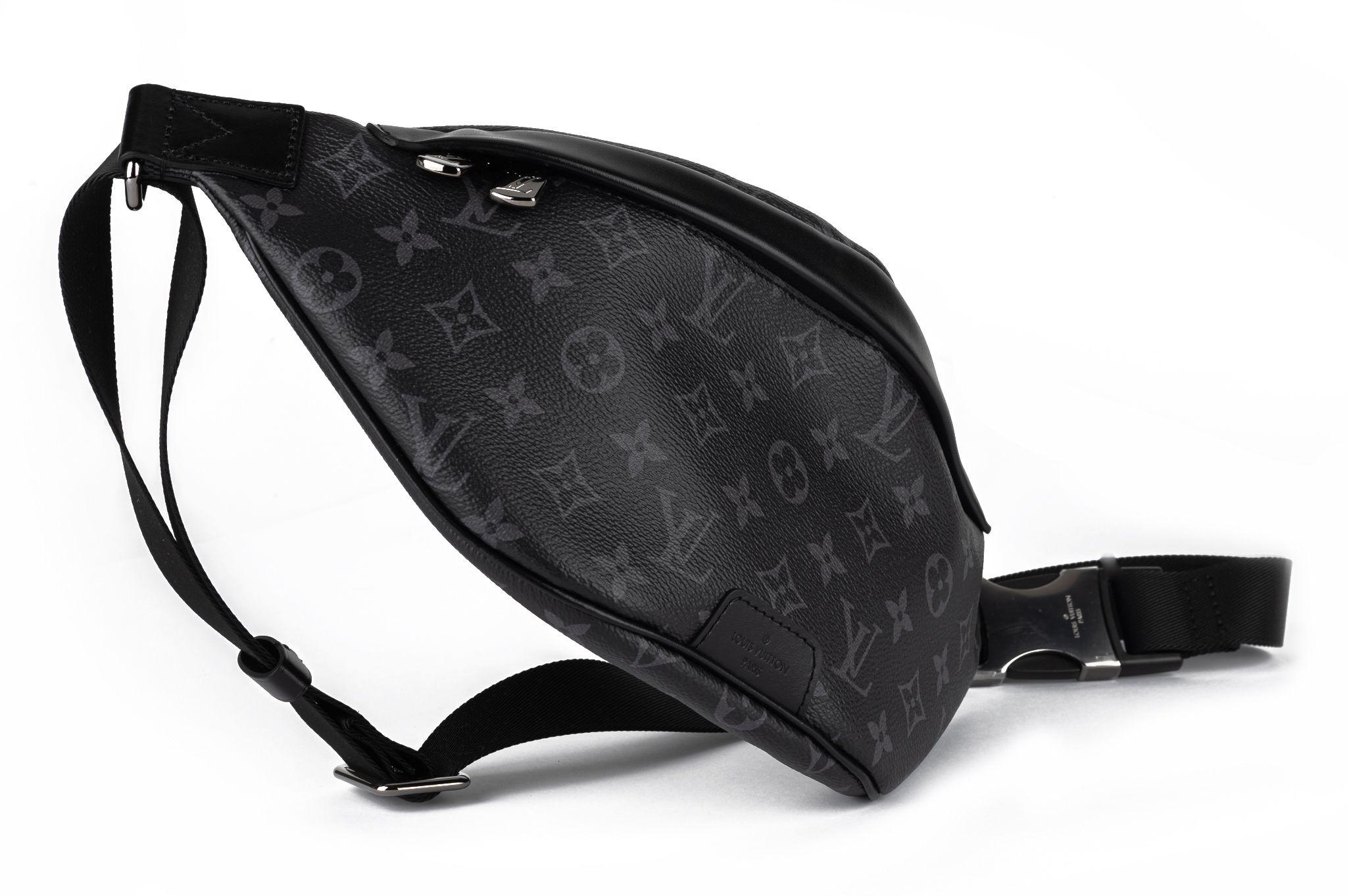 Louis Vuitton new pm grey monogram toile bumbag with adjustable strap. Zipped pockets front and back. Comes with original dustcover and box.