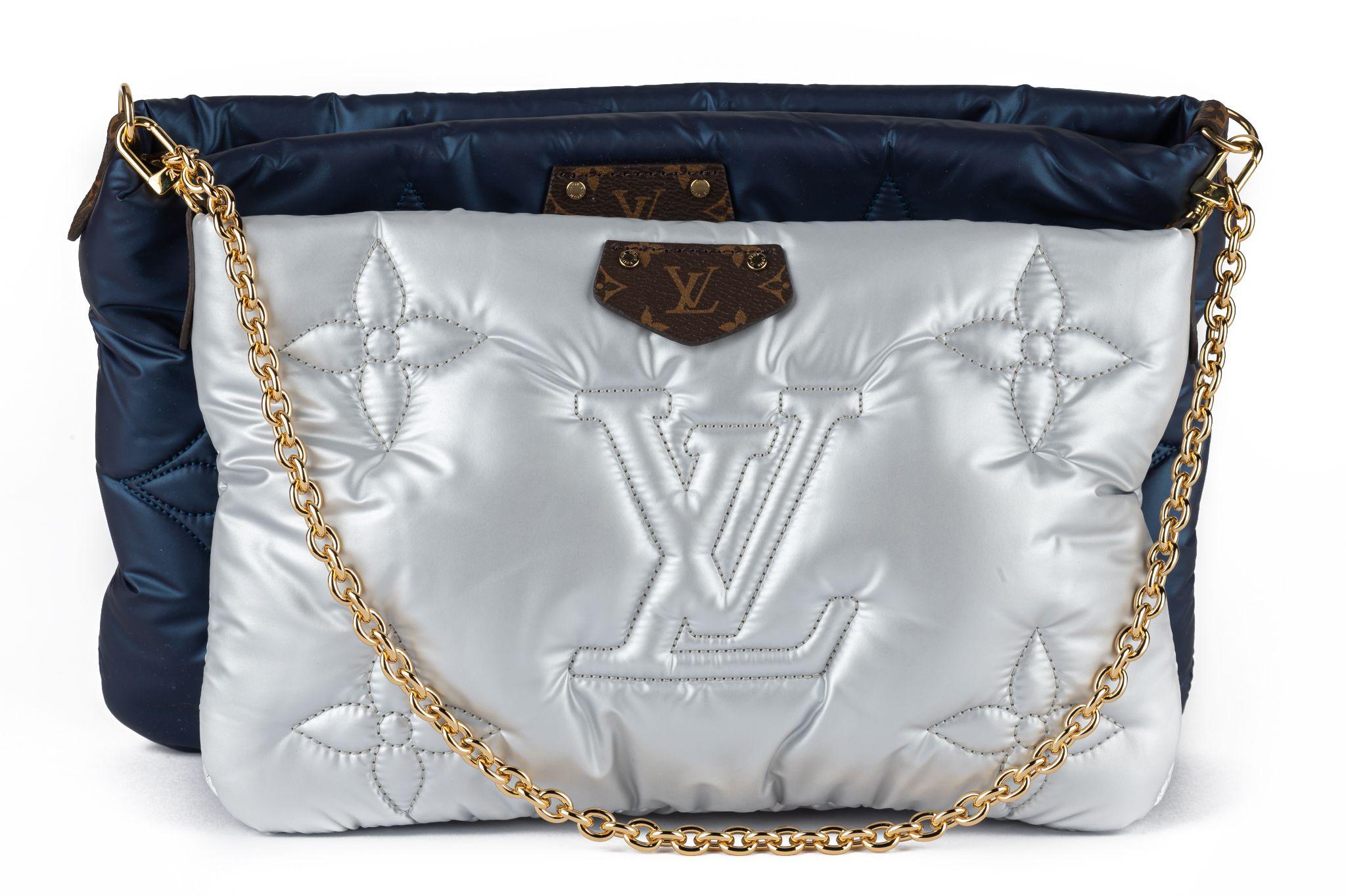 Louis Vuitton new Pillow capsule collection maxi multi pochette, blue and silver . The two bags can be worn separately. Detachable and adjustable Shoulder strap 13,5” ; shoulder strap chain 9.5” Comes with original dustcover and box.