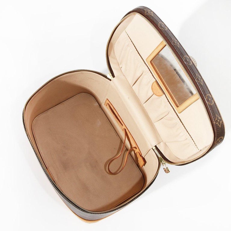 Leather vanity case Louis Vuitton Brown in Leather - 29708828