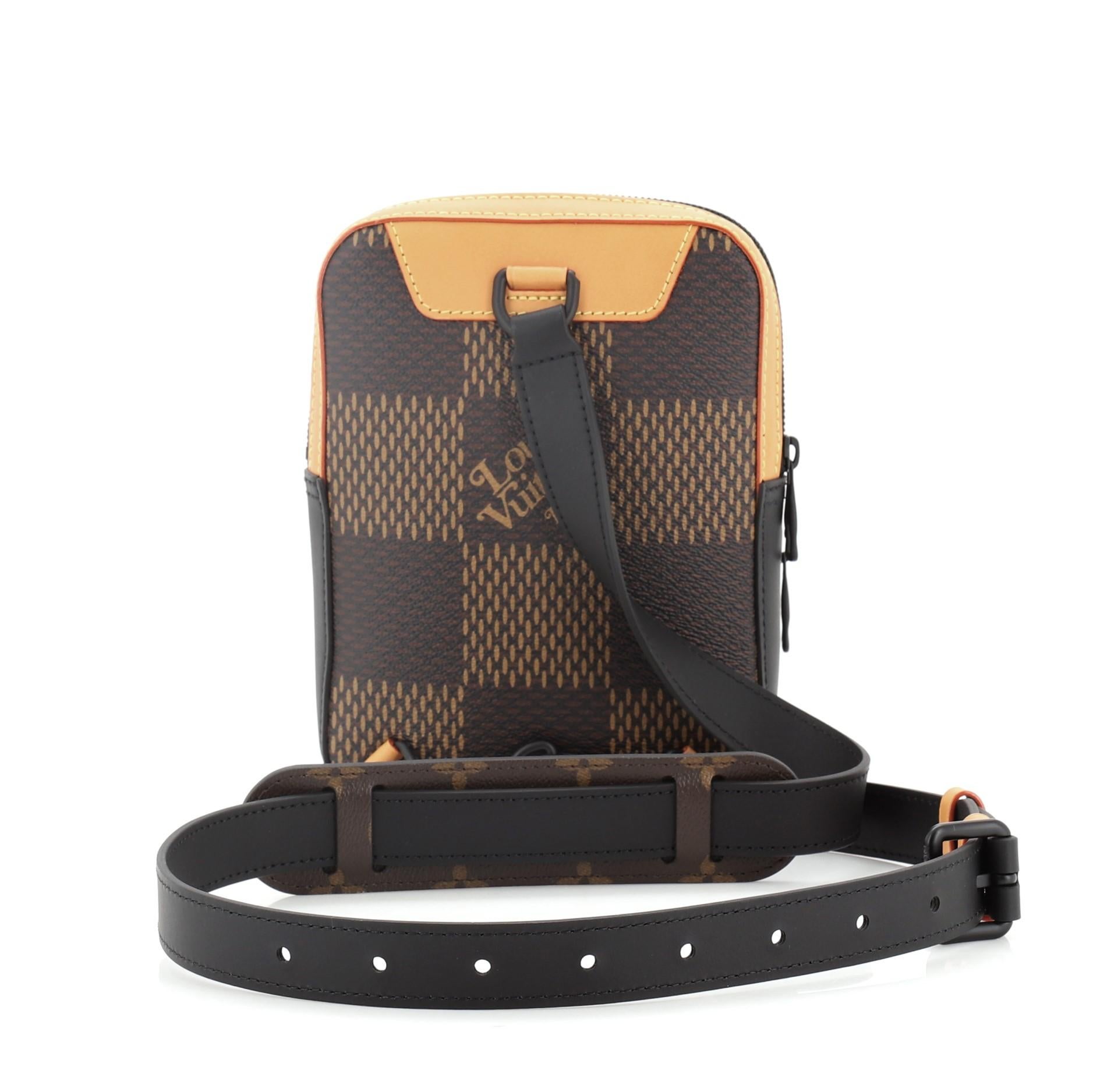 Louis Vuitton Nigo Amazone Sling Bag Limited Edition Giant Damier and Monogram Canvas with black hardware, fabric lining, exterior zipper pocket and zipper closure 

Height 8