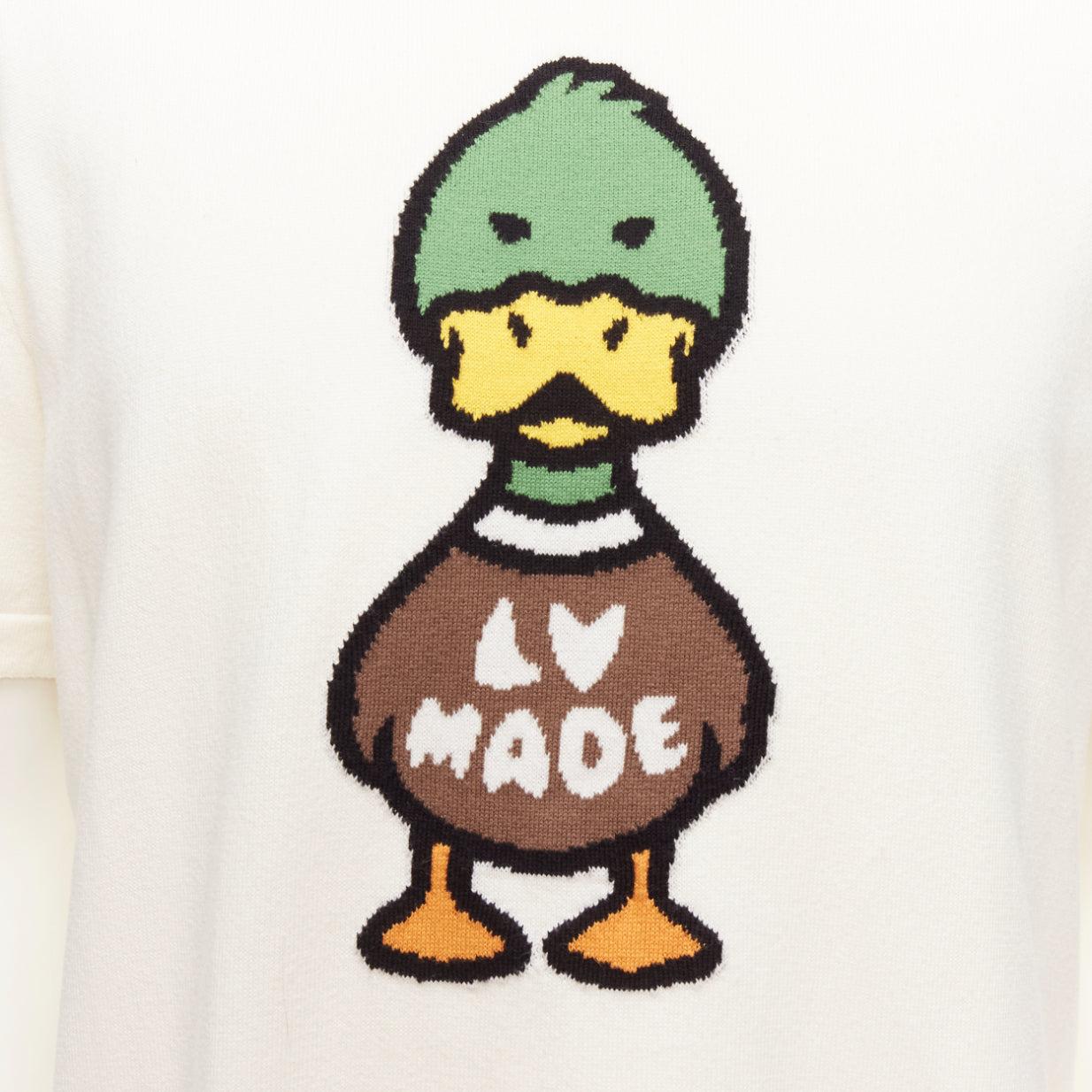 LOUIS VUITTON Nigo LV Made Duck cream intarsia jacquard knit top S
Reference: YIKK/A00014
Brand: Louis Vuitton
Collection: Nigo
Material: Cotton
Color: Cream, Green
Pattern: Abstract
Closure: Pullover
Made in: Italy

CONDITION:
Condition: Very good,