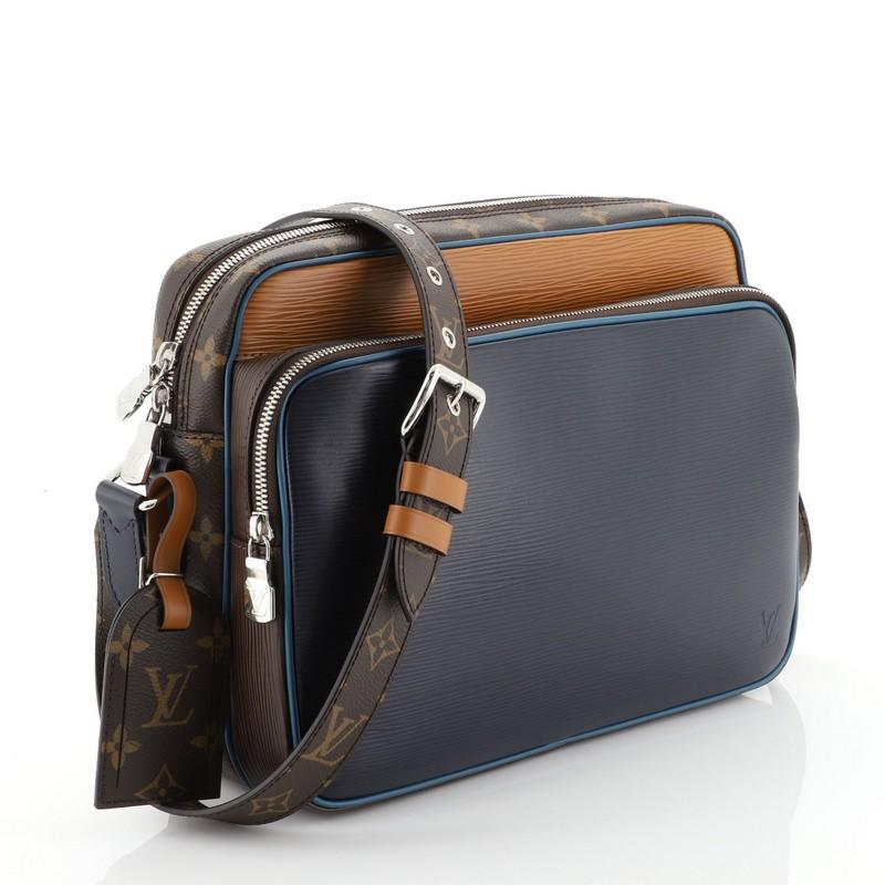 This Louis Vuitton Nil Slim Messenger Bag Epi Leather with Monogram Canvas PM, crafted in blue and orange epi leather and brown monogram coated canvas, features an adjustable canvas shoulder strap, exterior front zip pocket, and silver-tone