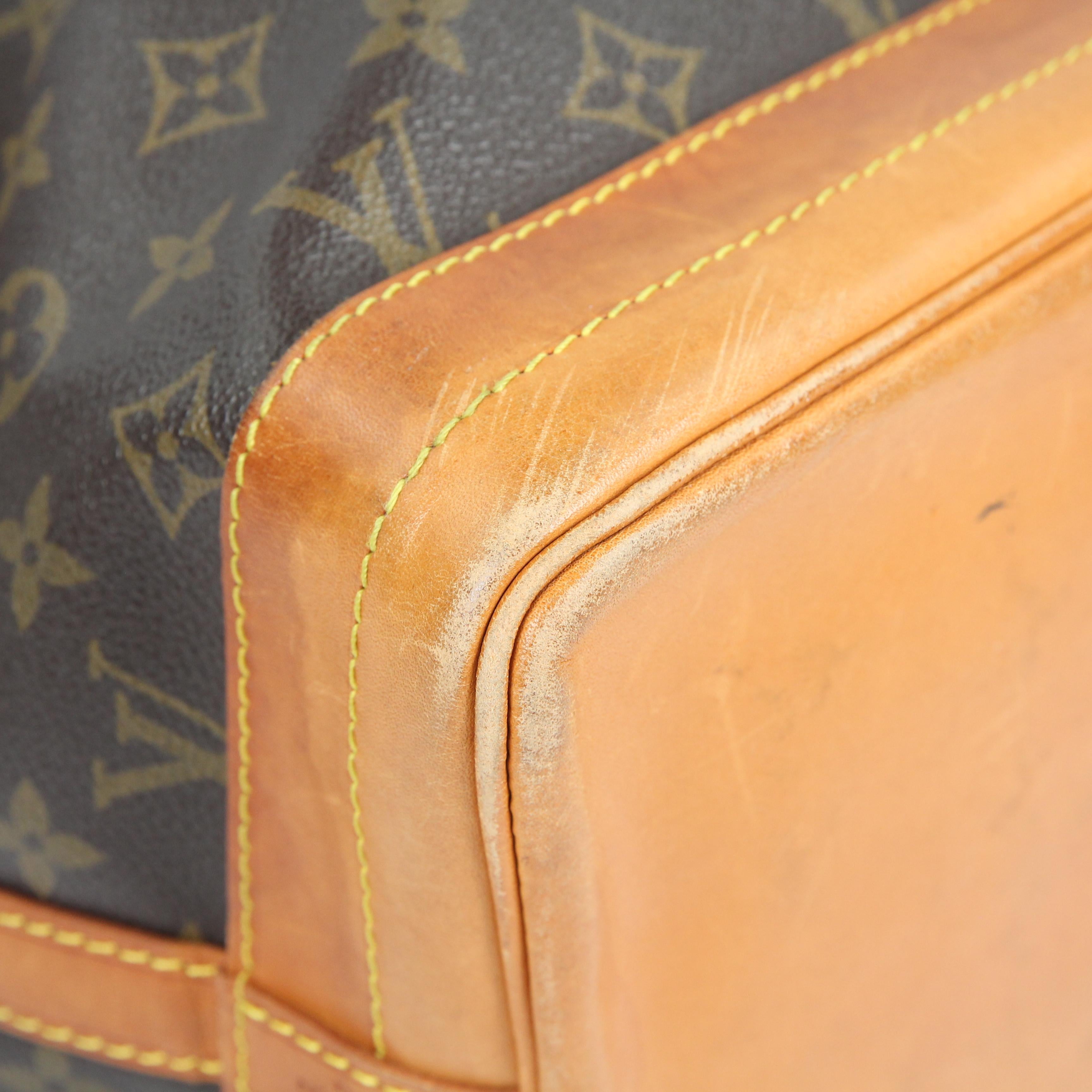 The Louis Vuitton Monogram Canvas Noe bag is a timeless and privileged piece that will never go out of style. It was originally created in 1932 to carry five bottles of champagne. With its ultra-spacious interior and leather drawstring closure, this