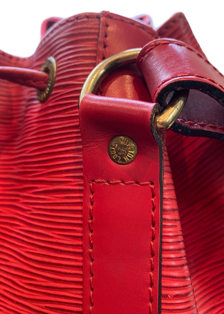 Sold at Auction: Louis Vuitton, Louis Vuitton Red Epi Leather Noe Bucket Bag