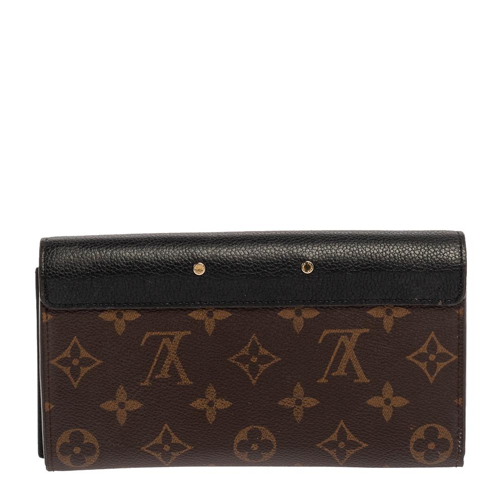 Basic essentials can be carried effortlessly in this feminine and functional Metis wallet by Louis Vuitton. This compact wallet is crafted from the brand's Monogram canvas & leather with leather lining. It offers quick and secure access to credit