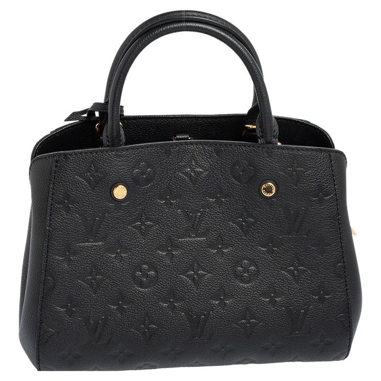 A handbag should not only be good-looking but also functional, just like this Montaigne bag from Louis Vuitton. Crafted from monogram Empreinte leather, this gorgeous number has a canvas interior, two rolled handles, and protective metal feet.