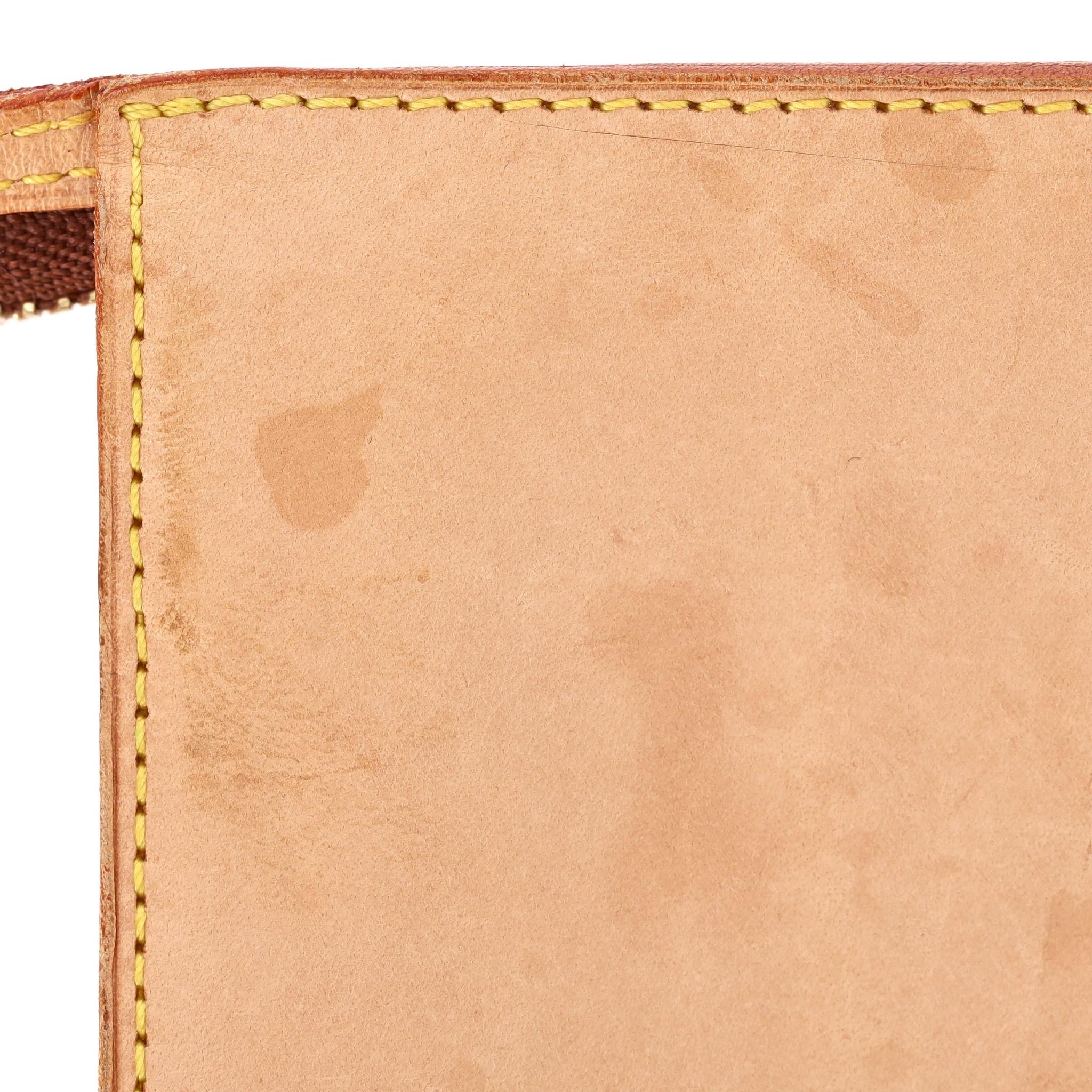 Louis Vuitton Nomade Leather Pochette Bag For Sale 6