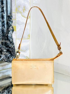 Louis Vuitton Nomade Leather Pochette Bag