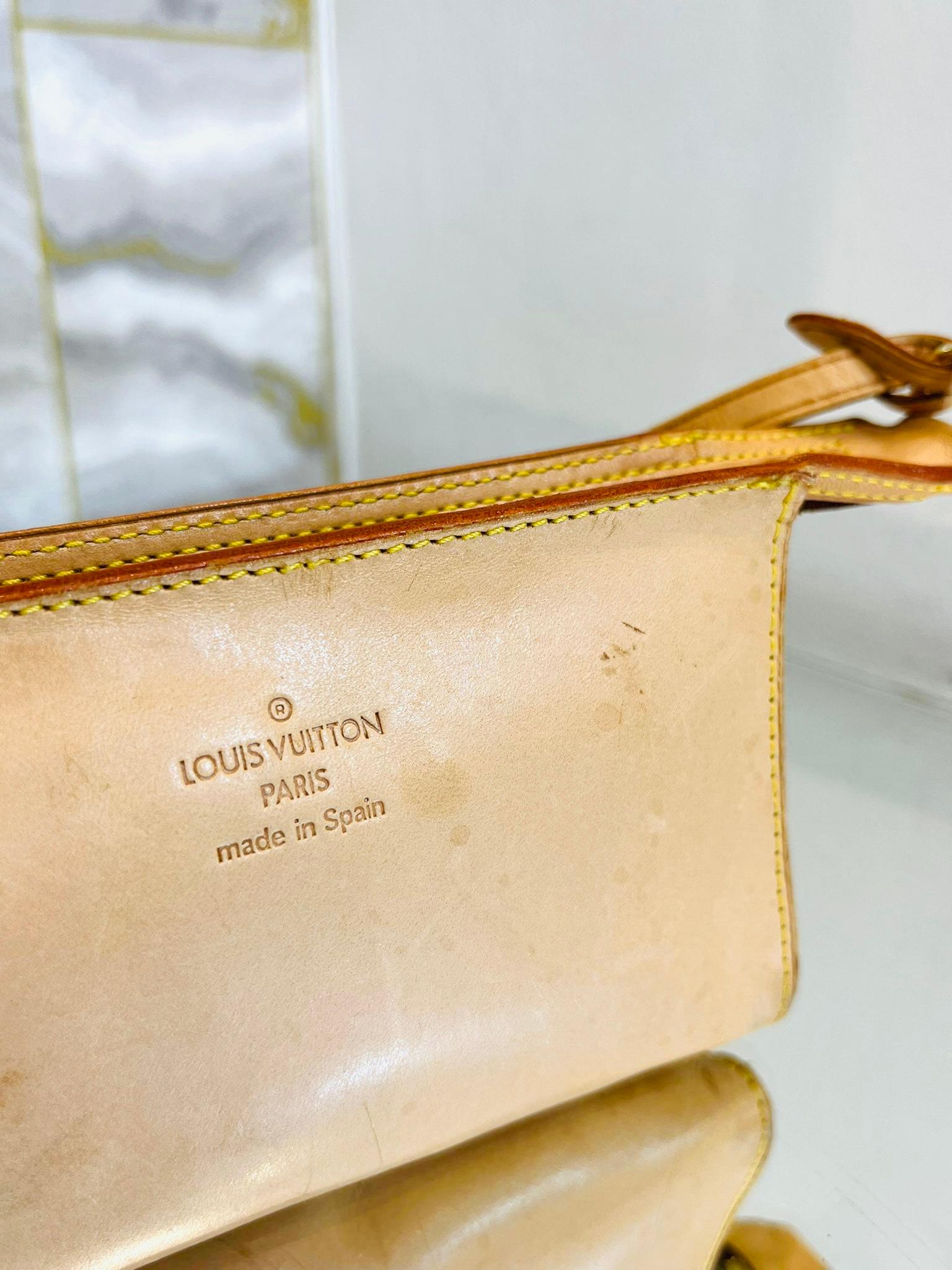 Louis Vuitton Nomade Leather Pochette Bag For Sale 2