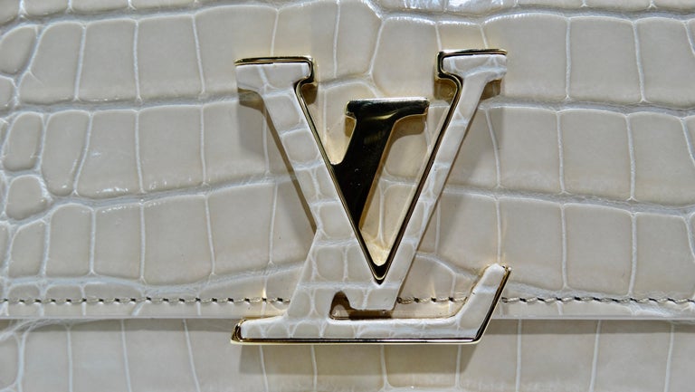 Louis Vuitton Nude Capucines Crocodile Wallet at 1stDibs