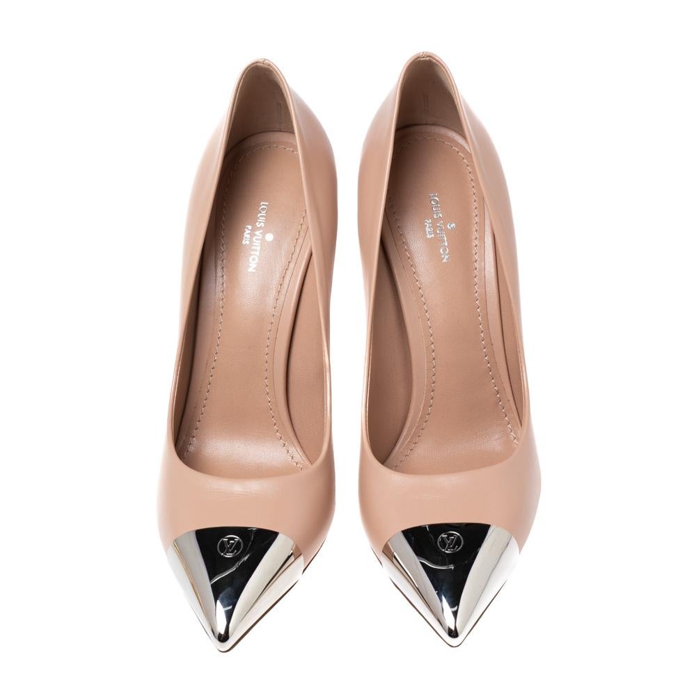 It is every woman's dream to own pumps as appealing as these Louis Vuitton ones. Crafted from leather, they come in a lovely shade of nude pink. They are designed to deliver high fashion and sophistication. They are styled with pointed, silver-tone