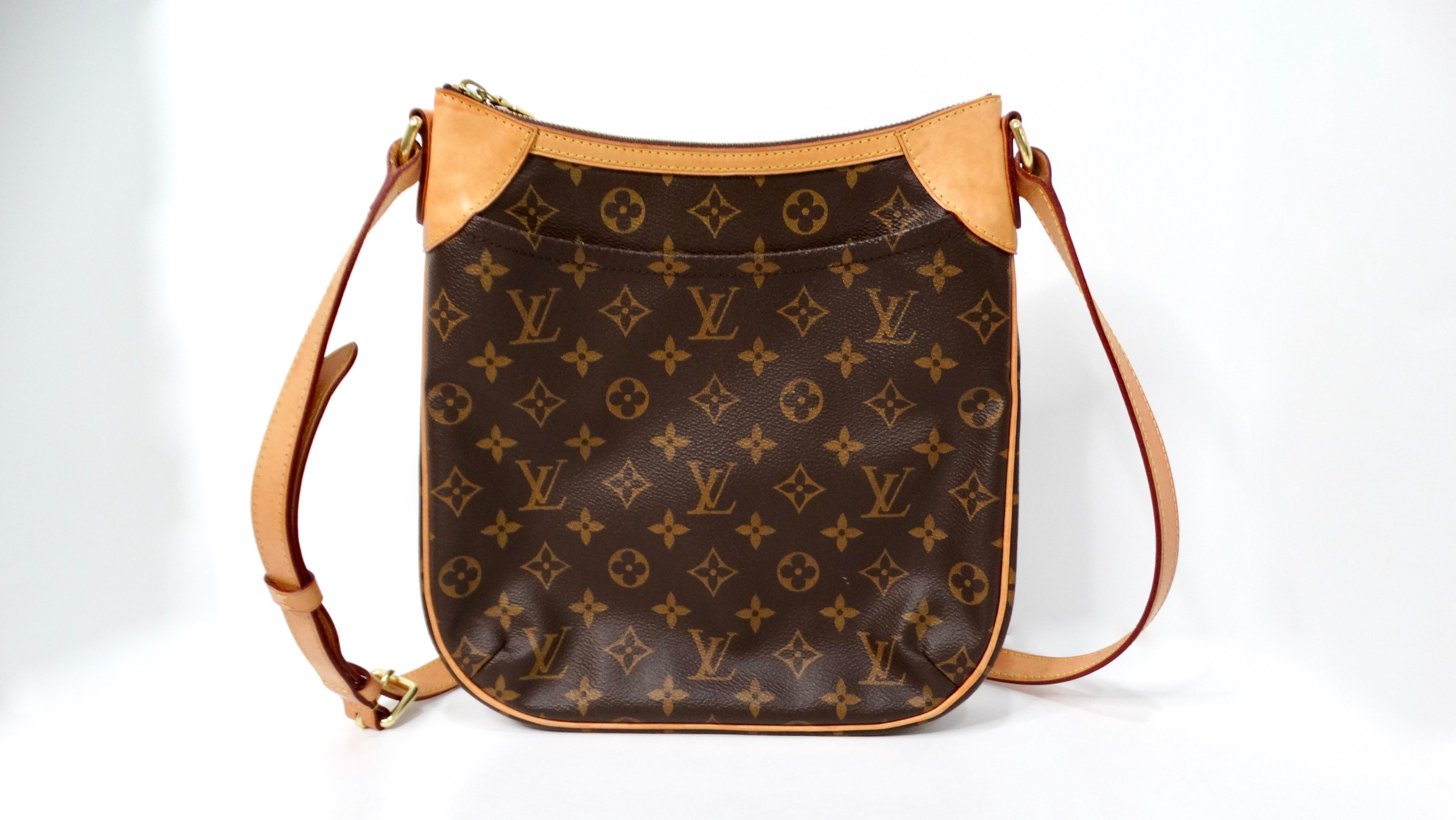 The Louis Vuitton Odeon PM Monogram Shoulder Bag is a quintessential accessory that epitomizes both luxury and practicality. Crafted from the iconic coated monogram canvas, this bag features a chic silhouette combined with an adjustable strap,