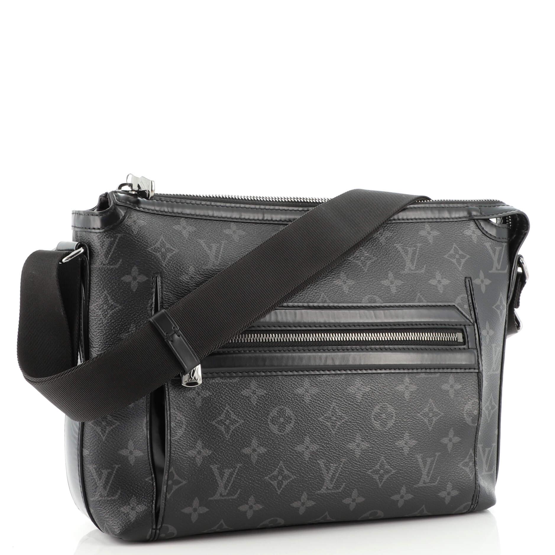 Condition: Very good. Slight odor in interior. Wear on base corners, creasing on exterior, bubbling and wear on leather trims. Minor wear on strap, cracking on side opening wax edges, wear and marks in interior, scratches and discoloration on