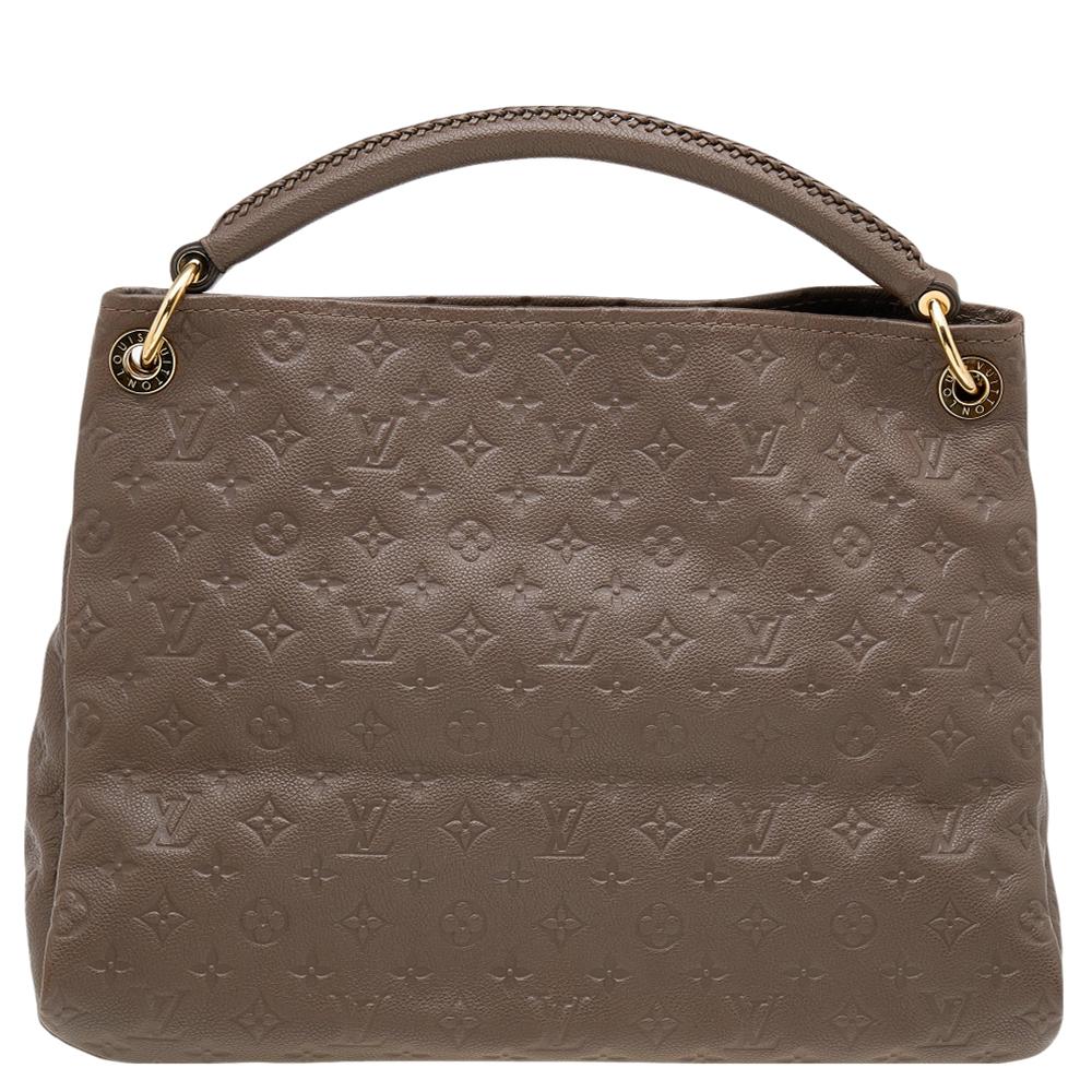 Louis Vuitton's Artsy is truly one of a kind. The feminine shape and handcrafted leather handle add to its beauty. It comes in the classic monogram Empreinte leather, paired with gold-tone hardware and the bag opens to a canvas-lined roomy interior