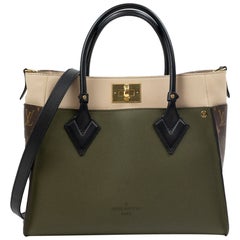 Louis Vuitton:: An meiner Seite in grünem Leder