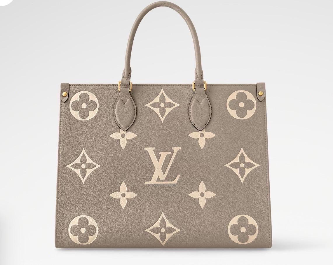 Louis Vuitton On The Go BICOLOR MM Monogram Empreinte Leather, Colombe/Crème en vente 1