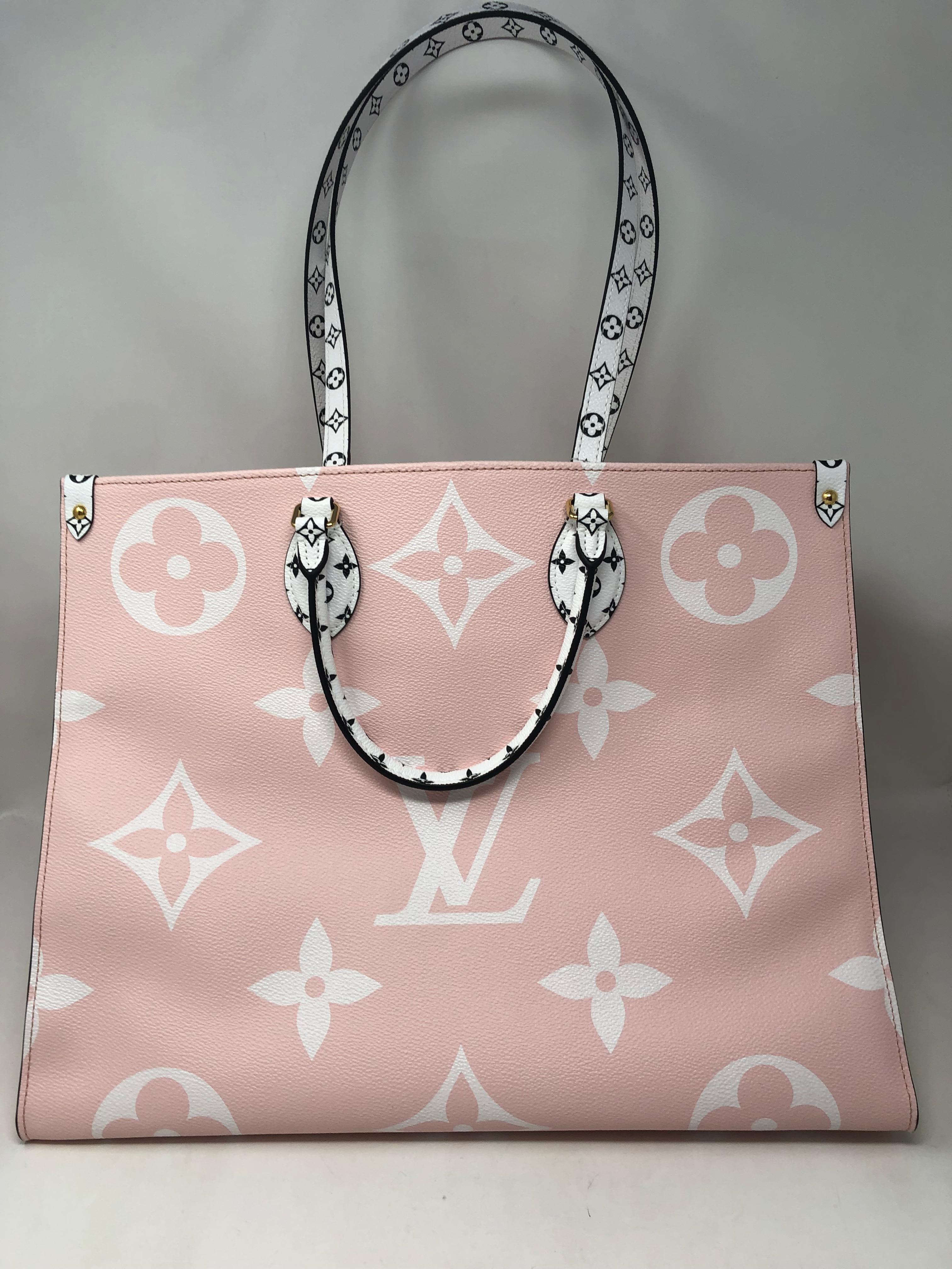 Louis Vuitton On The Go Tote Bag with Red, Pink, Yellow, Orange, and White. Rare and very limited bag. Brand new never used. Big Monogram collection. Don't miss out. Guaranteed authentic. 