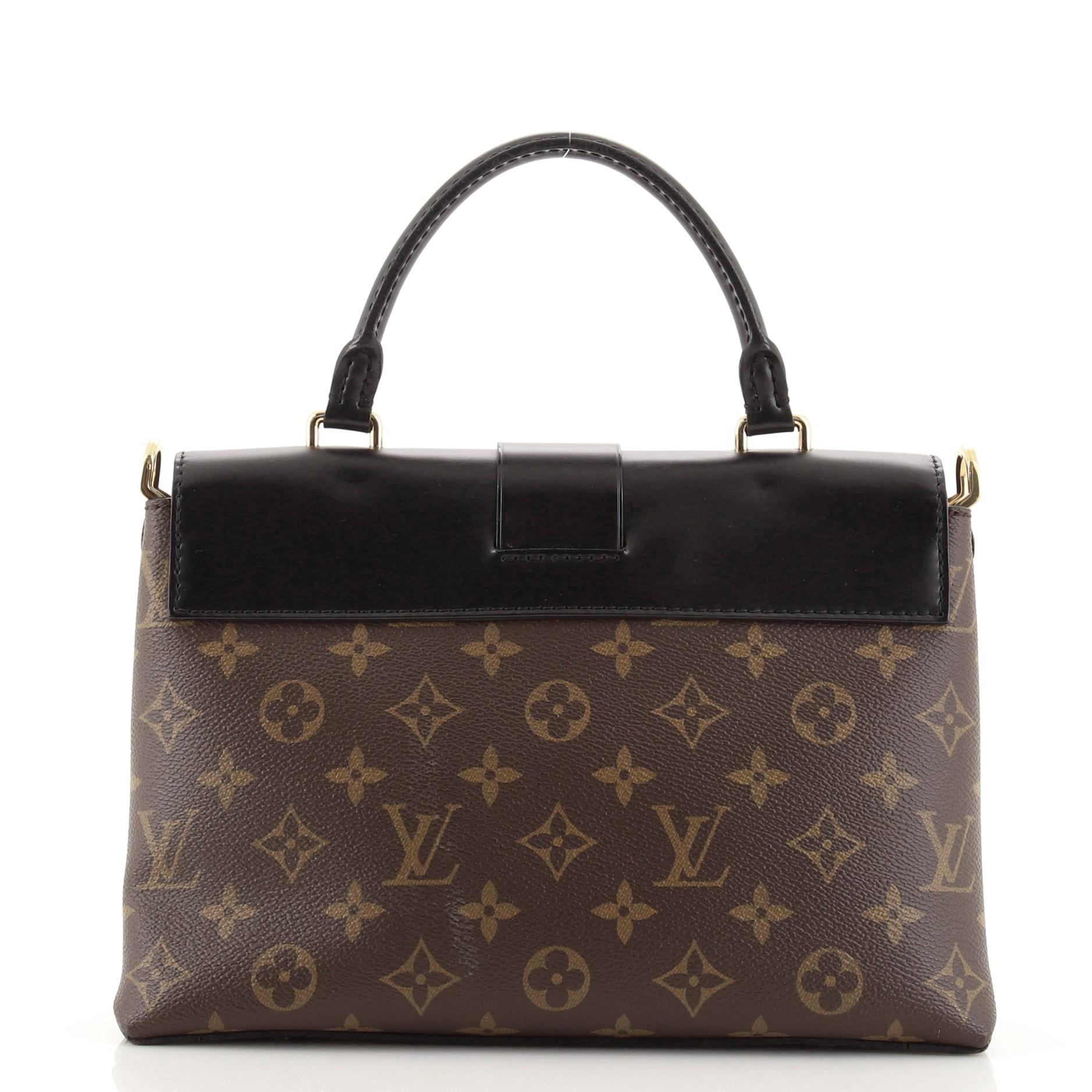 Ein-Hand-Klappentasche von Louis Vuitton aus Segeltuch und Leder mit Monogramm MM (Schwarz)