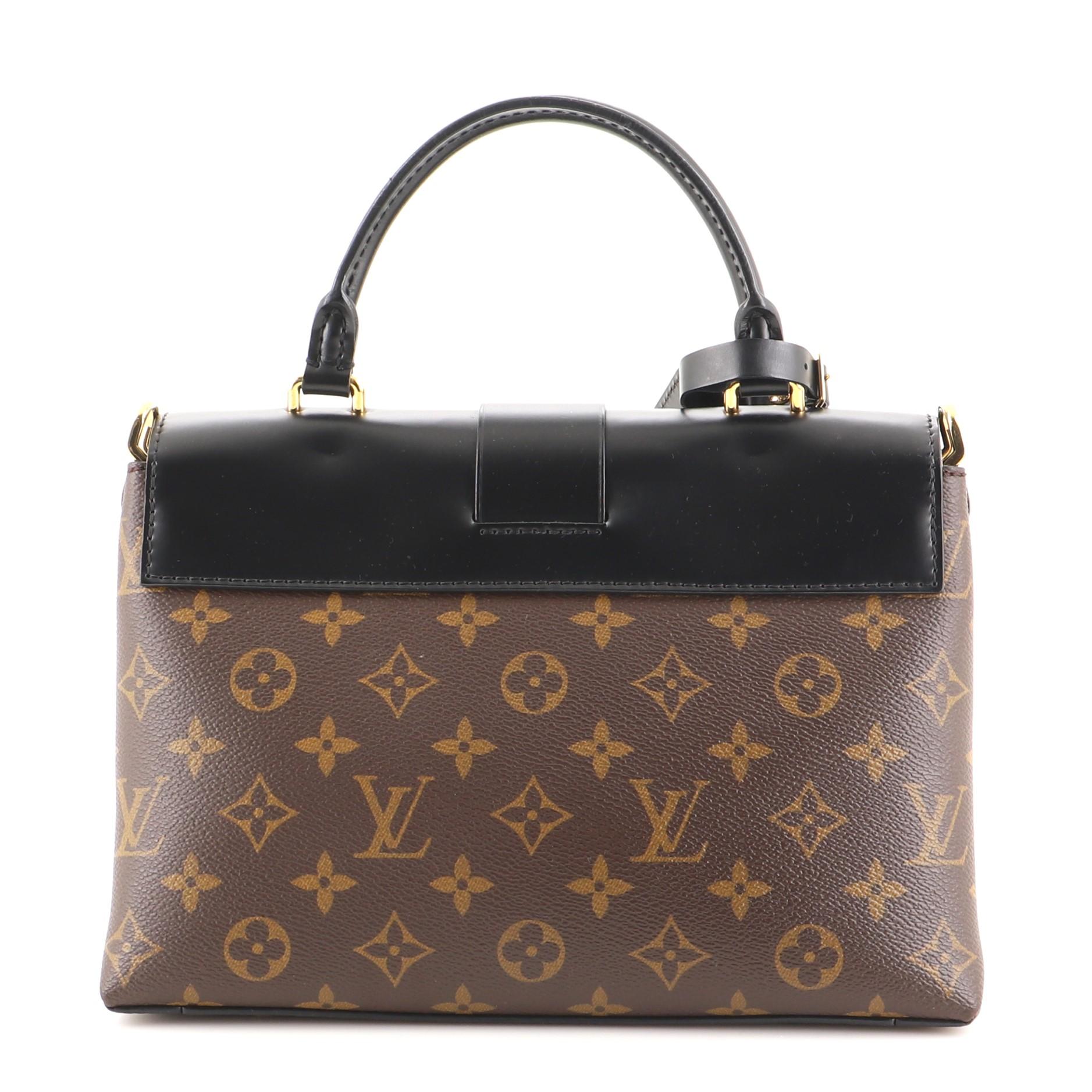 Ein-Hand-Klappentasche von Louis Vuitton aus Segeltuch und Leder mit Monogramm MM im Zustand „Gut“ in NY, NY