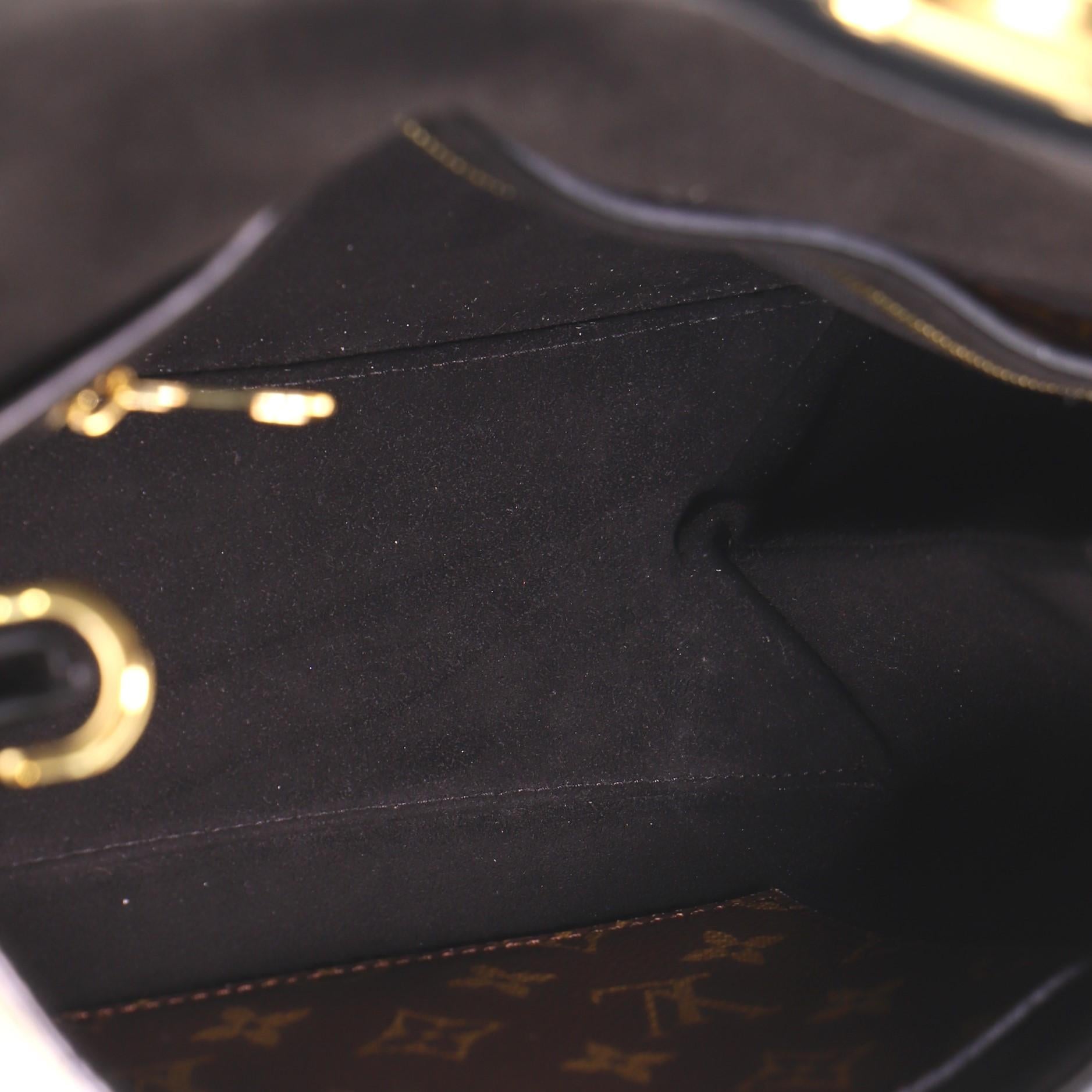 Ein-Hand-Klappentasche von Louis Vuitton aus Segeltuch und Leder mit Monogramm MM 1