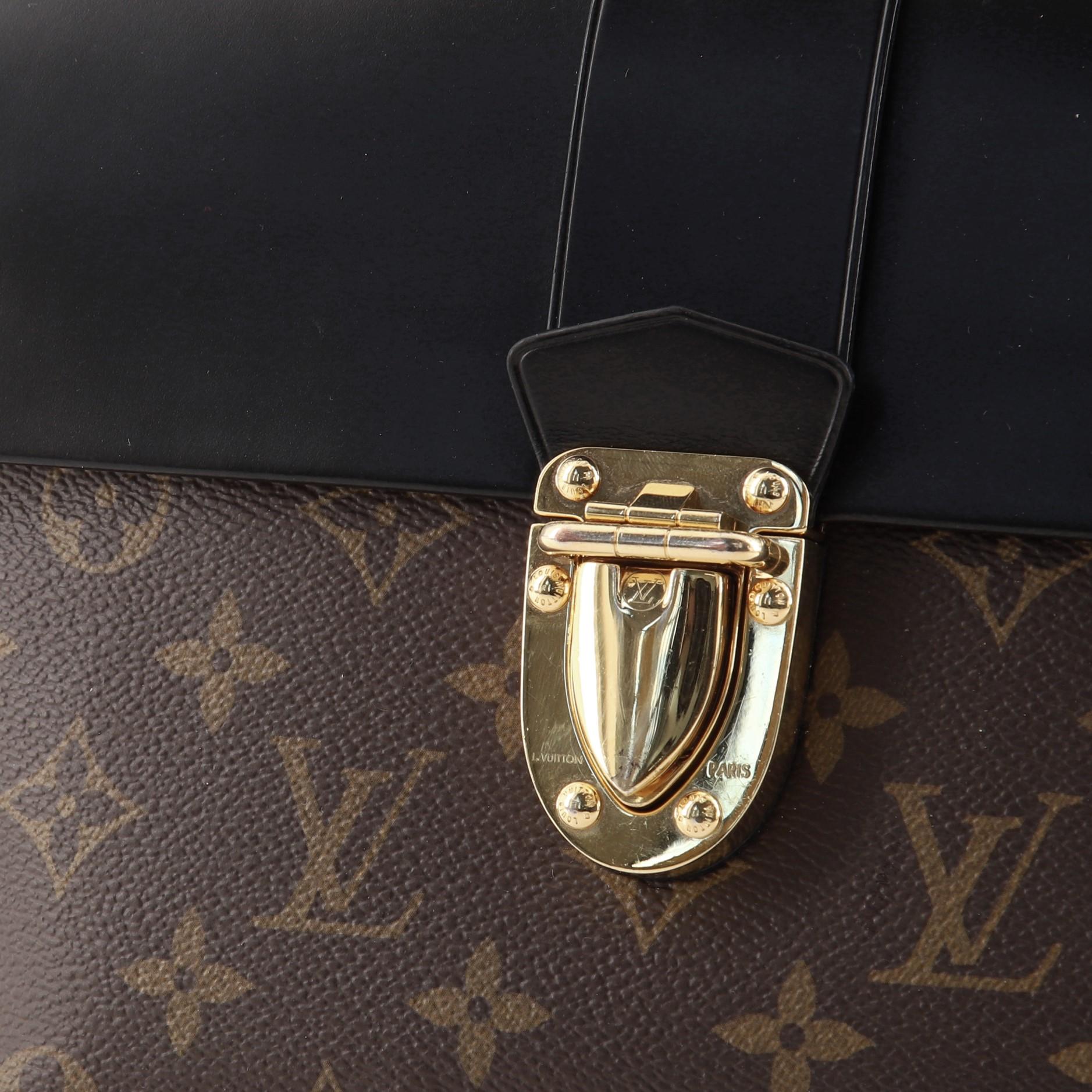 Ein-Hand-Klappentasche von Louis Vuitton aus Segeltuch und Leder mit Monogramm MM 1