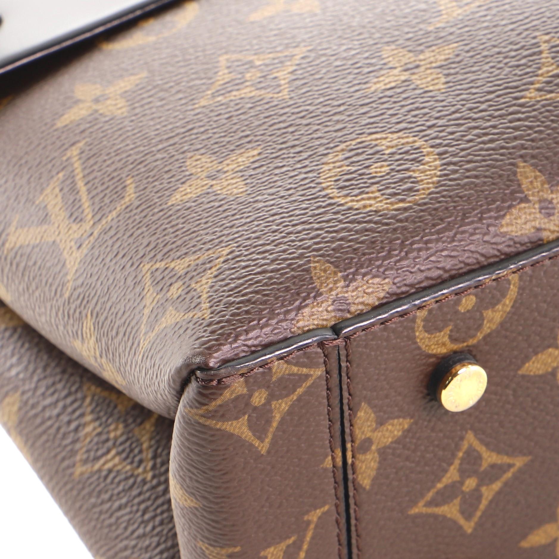 Ein-Hand-Klappentasche von Louis Vuitton aus Segeltuch und Leder mit Monogramm MM 2