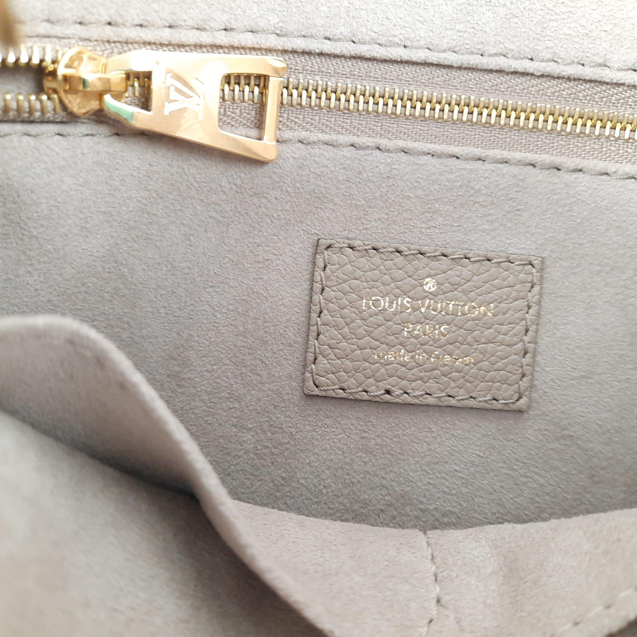 Louis Vuitton Onthego PM Tote Bag Tourterelle / Crème Monogram Empreinte Leather For Sale 3