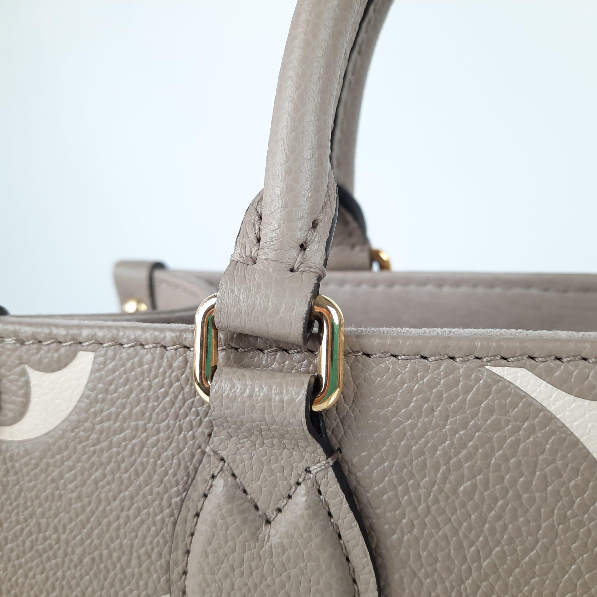 Louis Vuitton Onthego PM Tote Bag Tourterelle / Crème Monogram Empreinte Leather For Sale 4