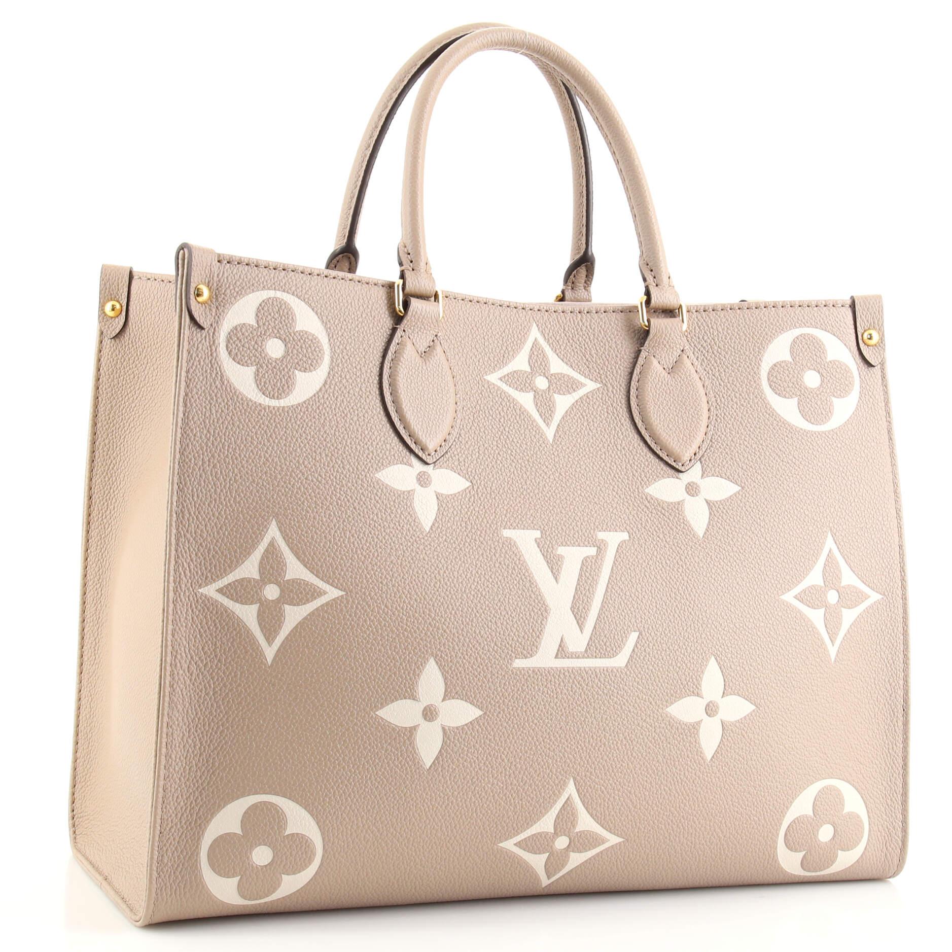 Louis Vuitton OnTheGo Tote Bicolor Monogram Empreinte Giant MM In Good Condition In NY, NY