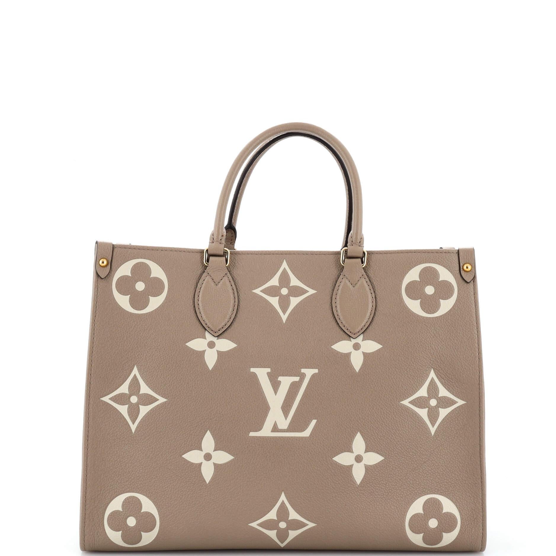 Louis Vuitton OnTheGo Tote Bicolor Monogram Empreinte Giant MM In Good Condition In NY, NY