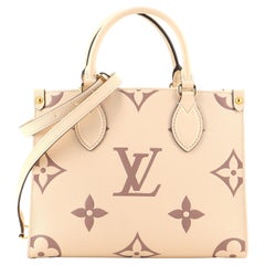 Louis Vuitton OnTheGo Tragetasche mit zweifarbigem Monogramm Empreinte Giant PM