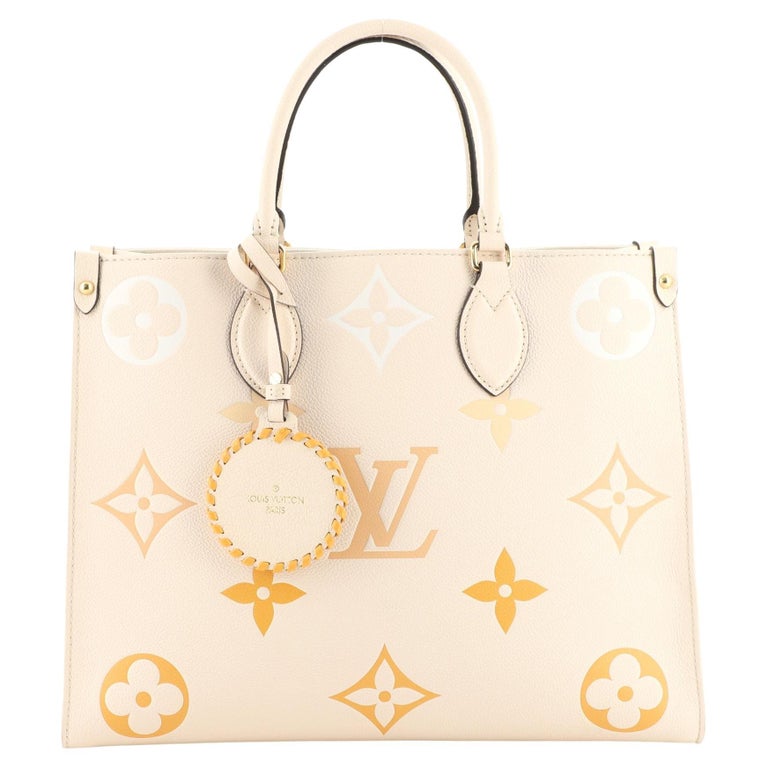 Louis Vuitton Onthego Monogram Giant GM Creme in Empreinte Leather with  Gold-tone - US