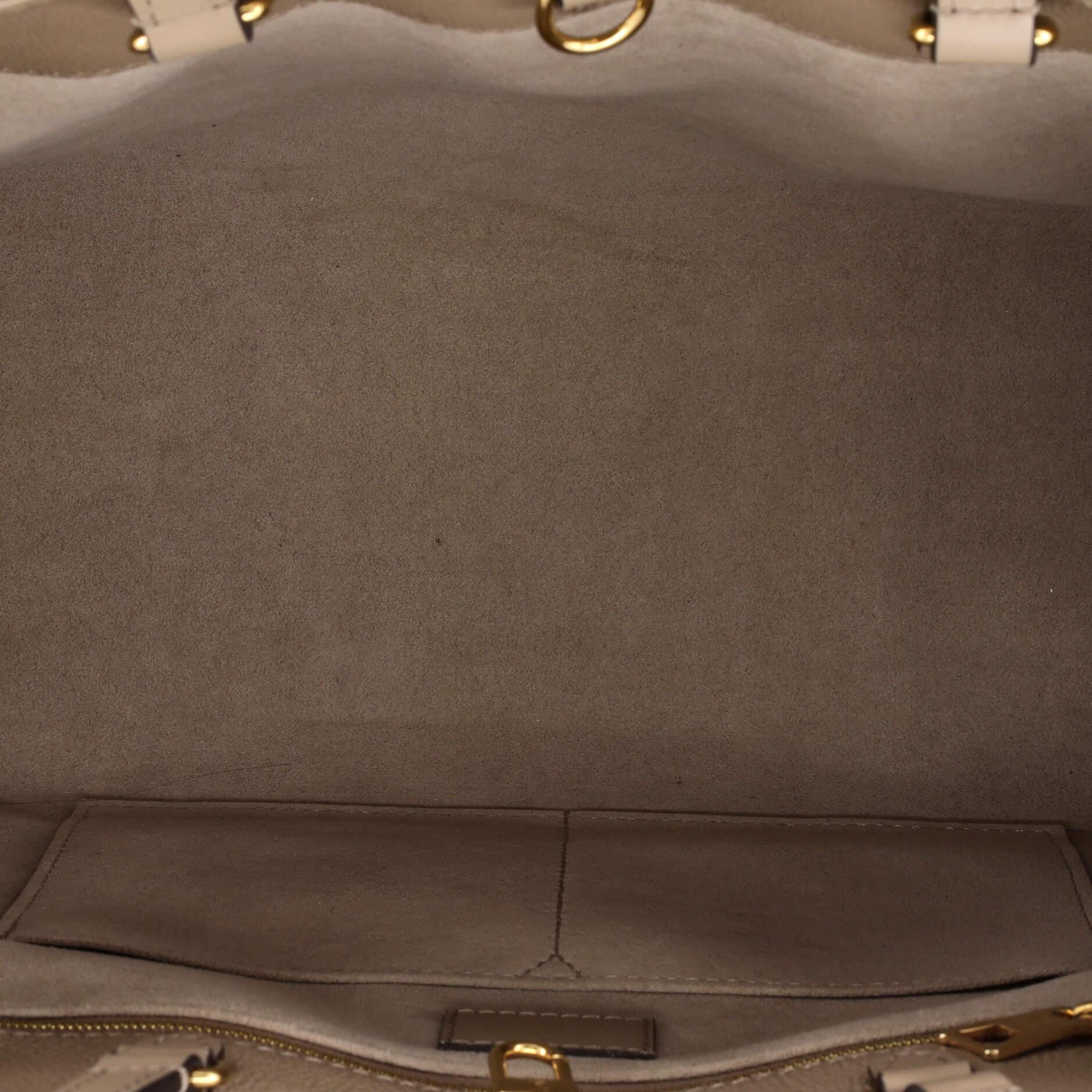 Louis Vuitton OnTheGo Tote Monogram Empreinte Giant MM For Sale 1