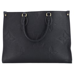 Louis Vuitton Black and Cream Empreinte Giant Monogram OnTheGo MM