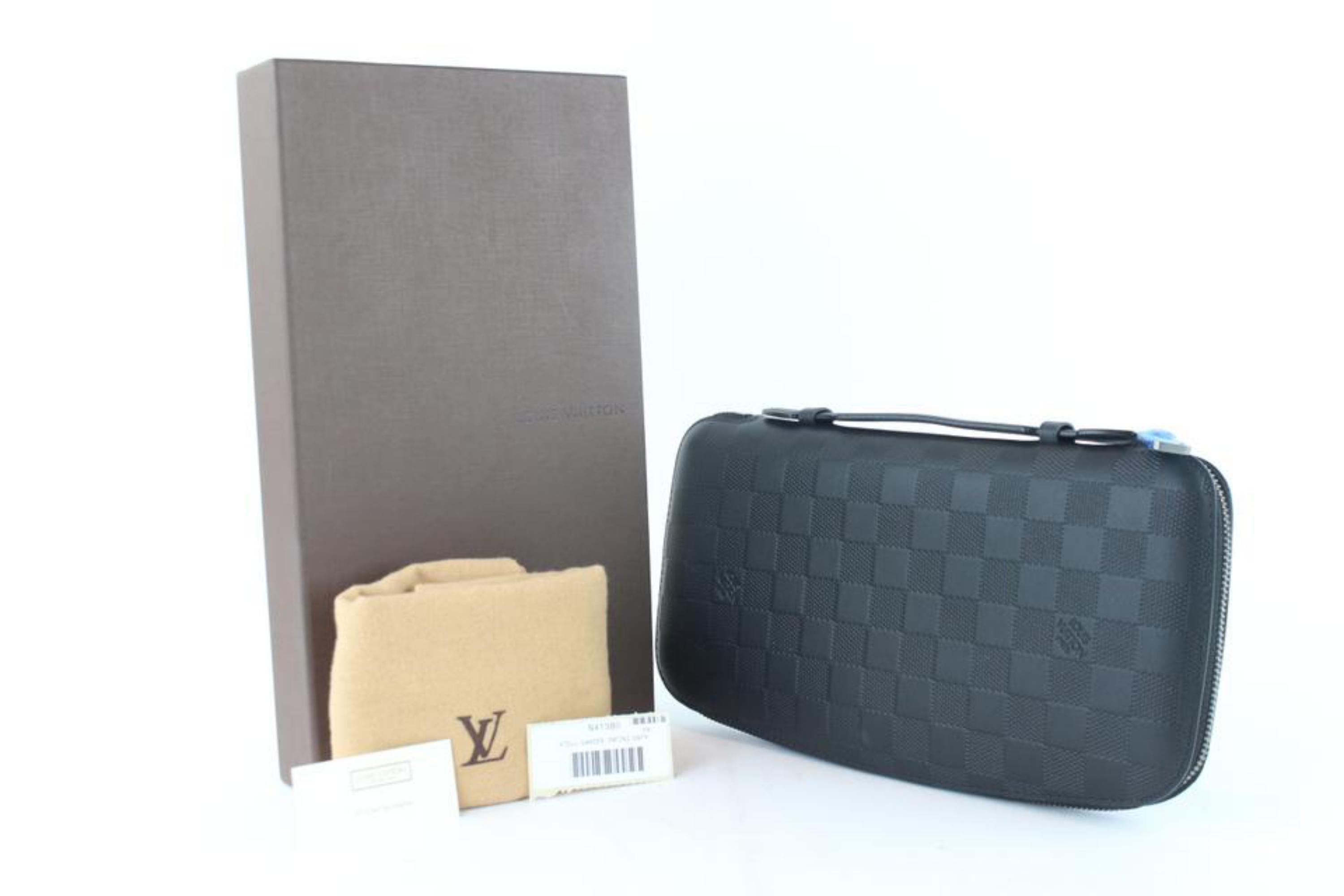 Louis Vuitton Black Taiga Leather Atoll Travel Organizer at 1stDibs