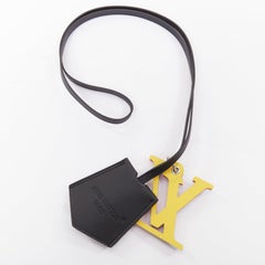 LOUIS VUITTON optic blue yellow logo black leather luggage tag