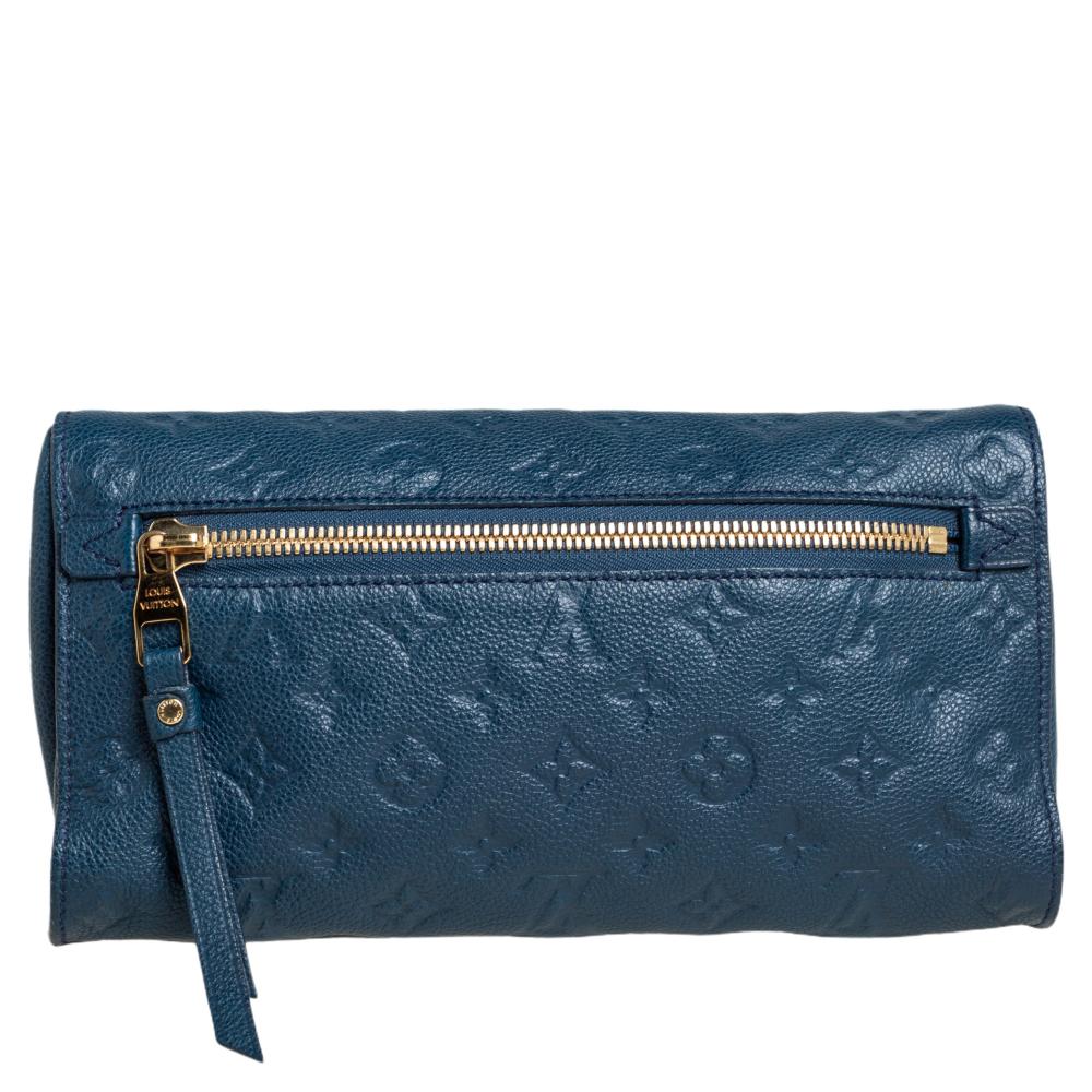 This Louis Vuitton Petillante clutch is packed with luxury and utility. Crafted using Monogram Empreinte leather, this LV clutch is a fine accessory to carry your essentials. It features zipped pockets and a zip-enclosed canvas interior.

Includes: